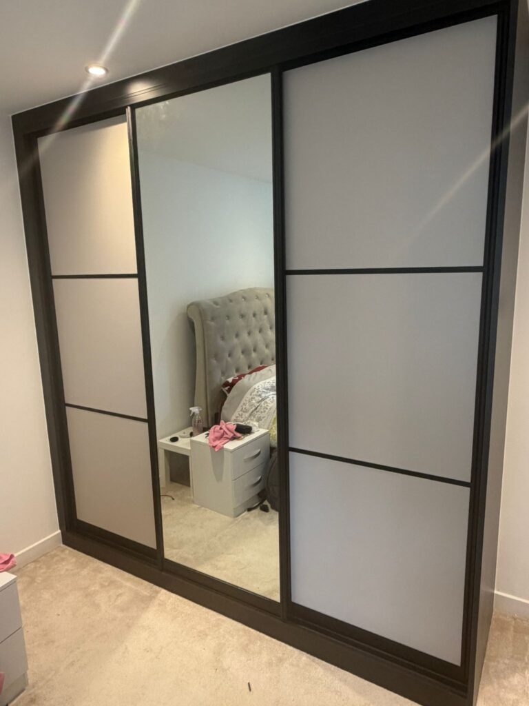 Bedroom sliding wardrobe by Python Kitchen