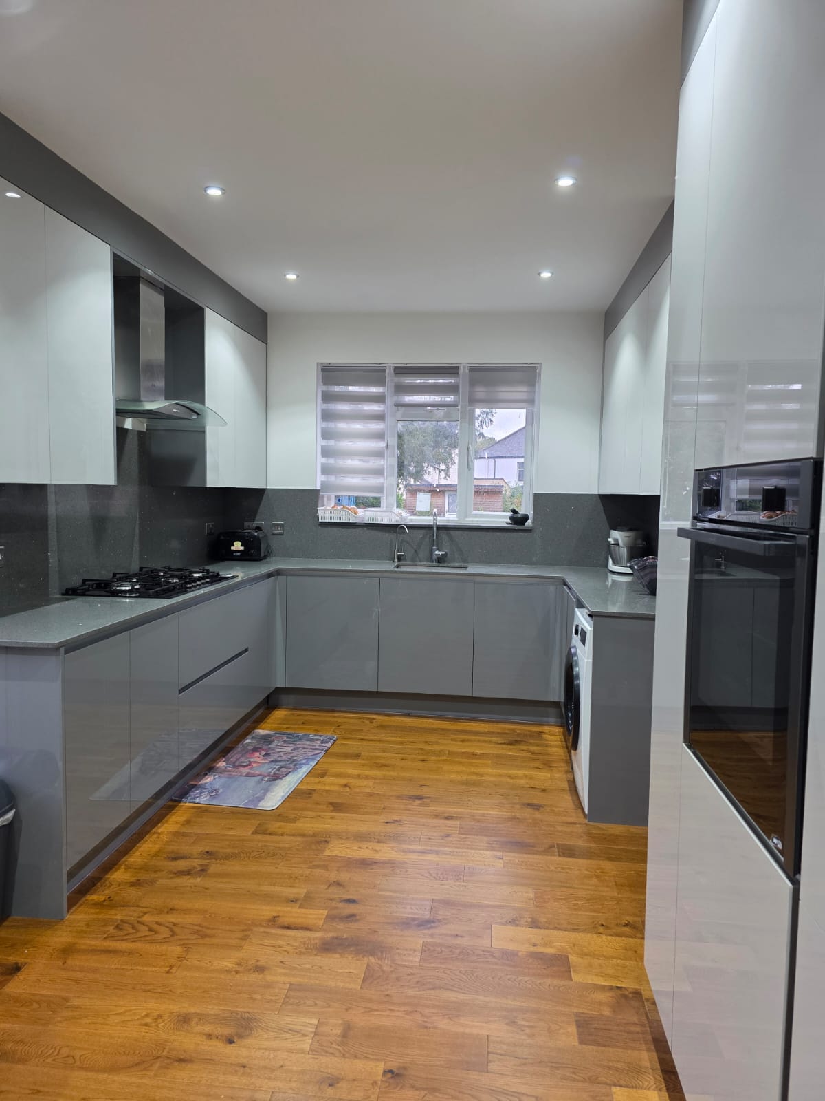 Handleless grey kitchen by Python Kitchen